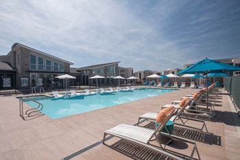 community swimming pool with lounge chairs  at Lumina at Spanish Springs, Sparks, NV